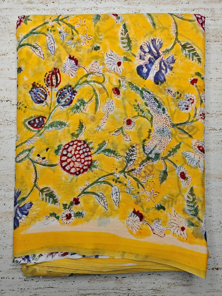 Attractive Yellow Repid Jaal HandBlock Super Georgette saree